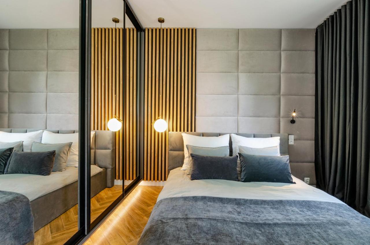 Lupoapartments Kaucja Лодзь Экстерьер фото